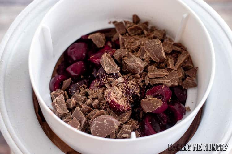 chopped chocolate and cherries being added