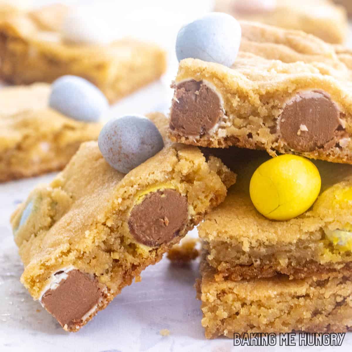 close up on stack of the mini egg cookie bars