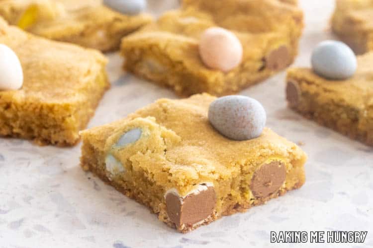 one of the mini egg cookie bars on a surface