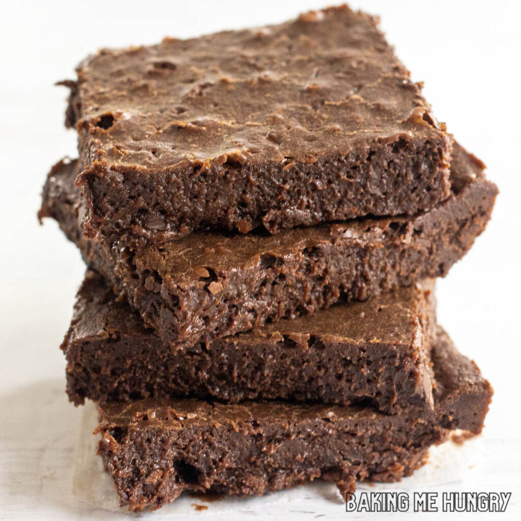 condensed milk brownies in a stack of 4
