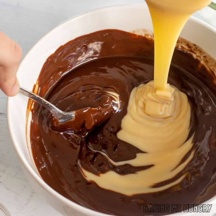 sweetened condensed milk being added to bowl