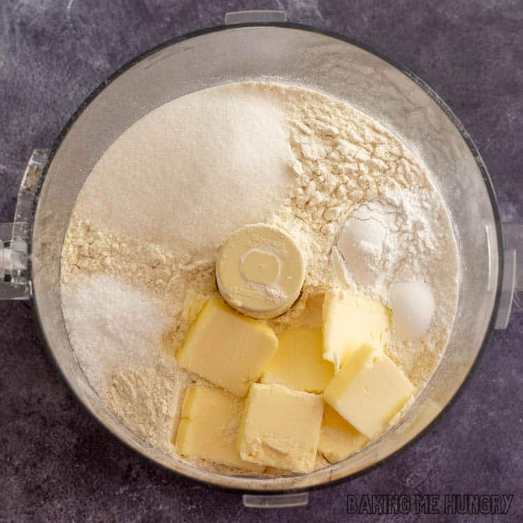 dry ingredients in food processor with butter