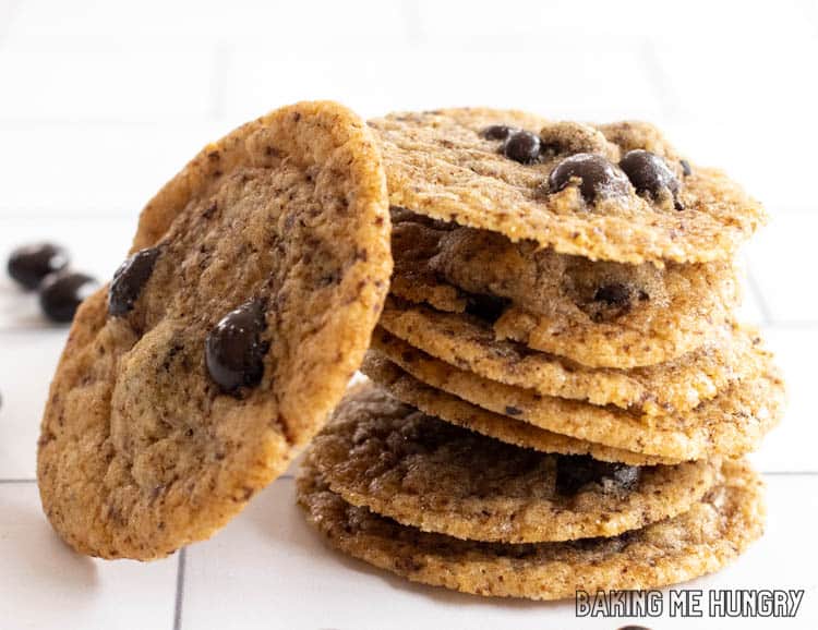 stack of coffee bean cookies with one leaning on it