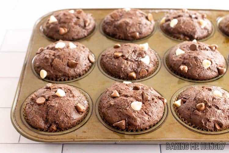 baked triple chocolate muffins in tin