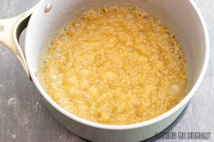 bubbly golden liquid in pan