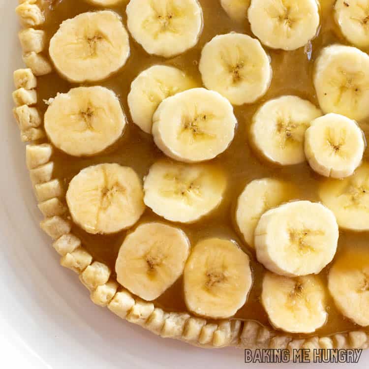 close up of banana slices on tart