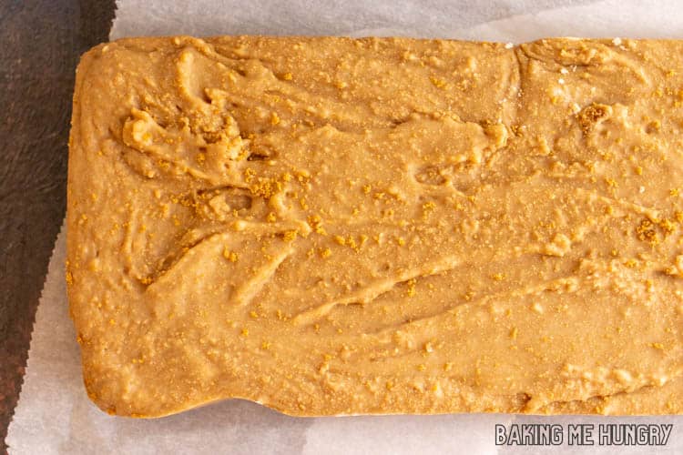 tan colored fudge resting on waxed paper