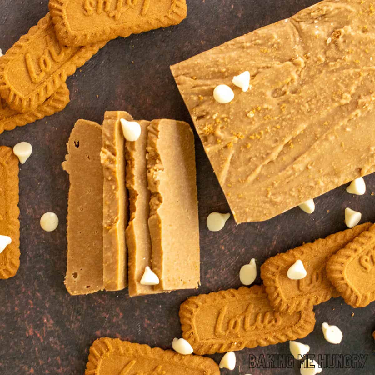 overhead shot of biscoff fudge sliced next to biscuits