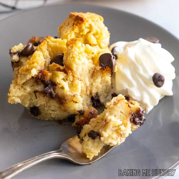piece of chocolate chip bread pudding on a gray plate