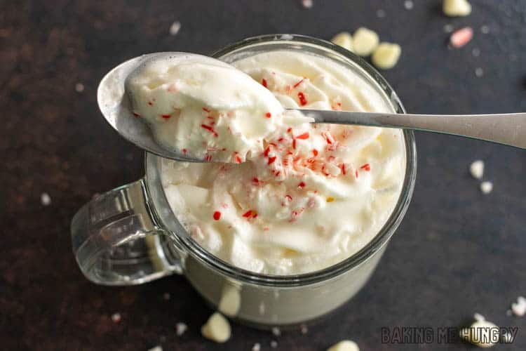 spoon resting on the rim of the white chocolate