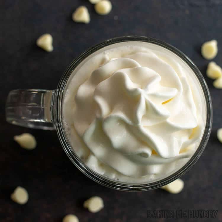 overhead shot of whipped cream on top of drink