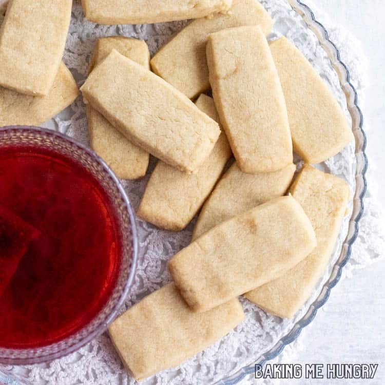 plate of cookies with a cup of tea