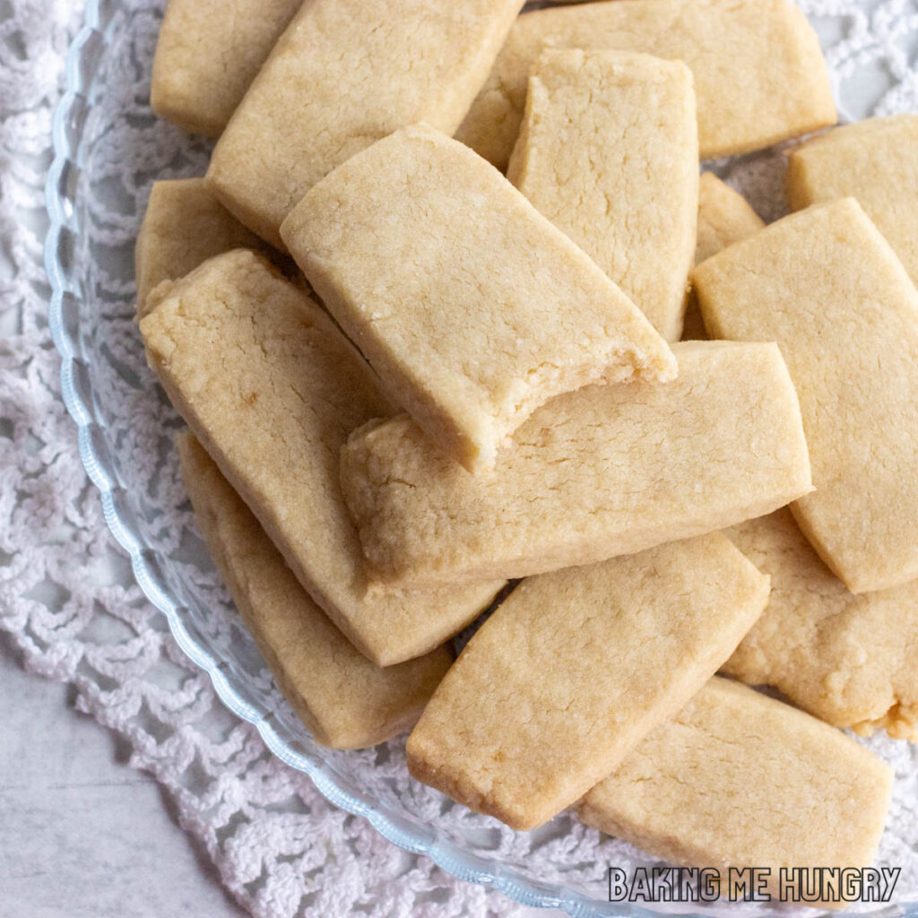 plate of 3 Ingredient Brown Sugar Cookies with one with a bite missing