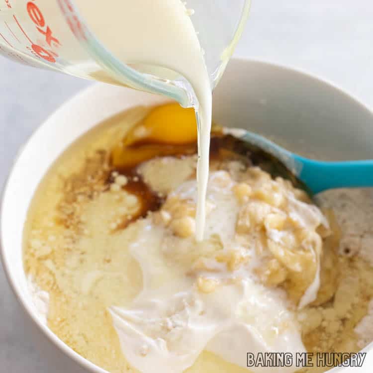 milk and oil being poured into bowl