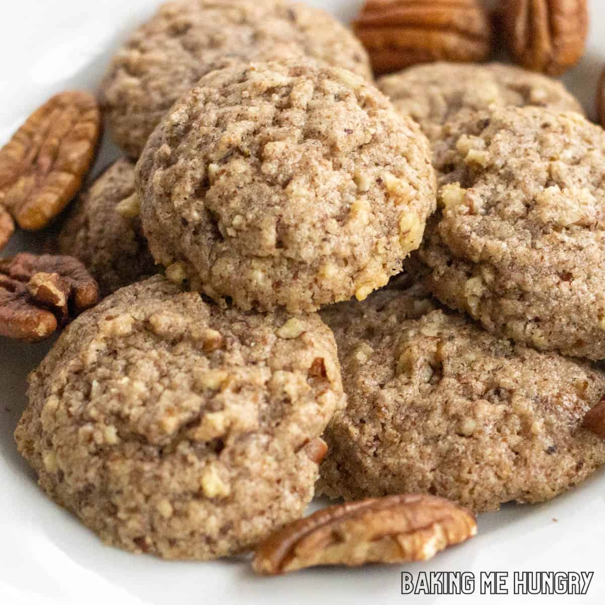 brown butter pecan cookies piled on a plate