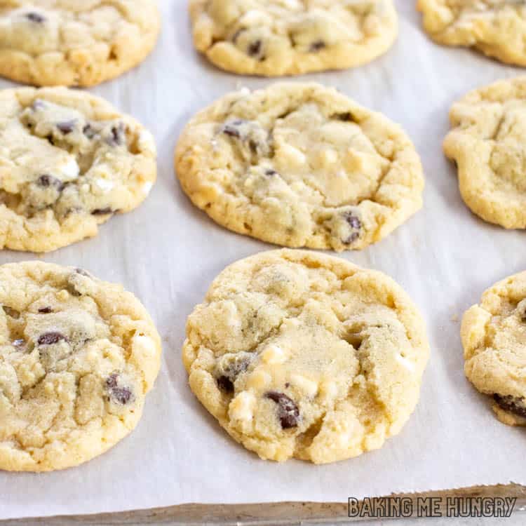 chocolate chip marshmallow cookies on parchment paper lined baking sheet