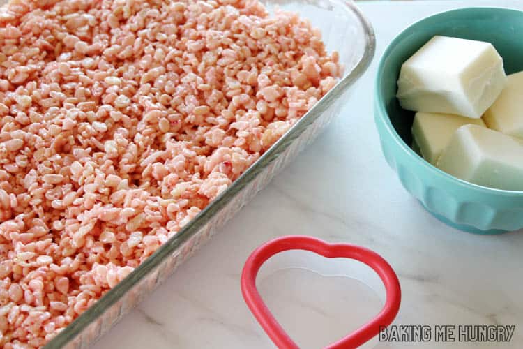 baking dish with marshmallow cereal mixture pressed into it