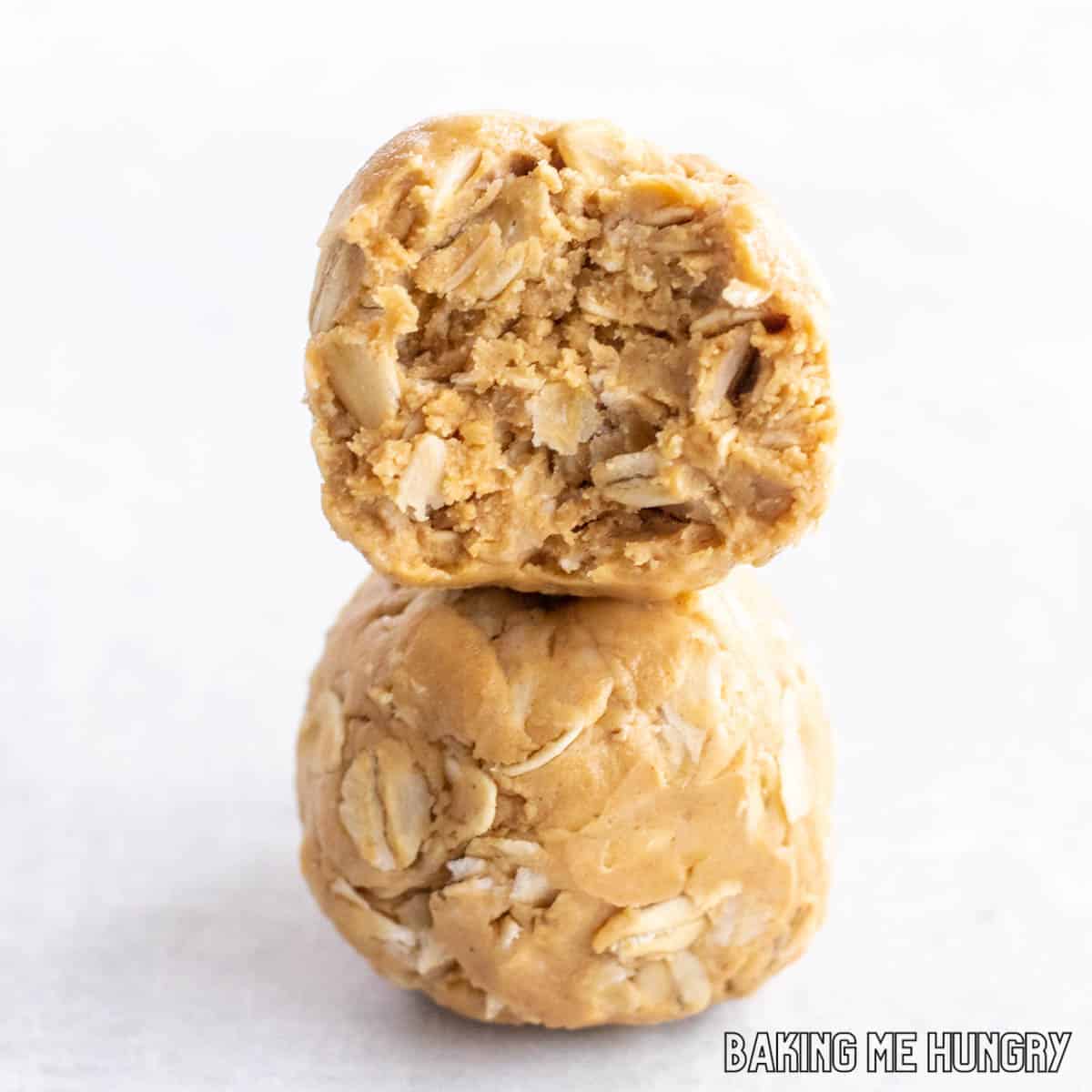 two of the 3 ingredient peanut butter oatmeal balls stacked on top of each other