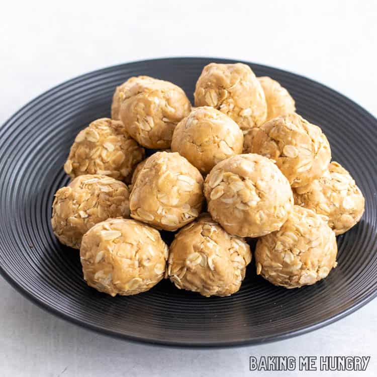 plate with a pile of 3 ingredient peanut butter balls