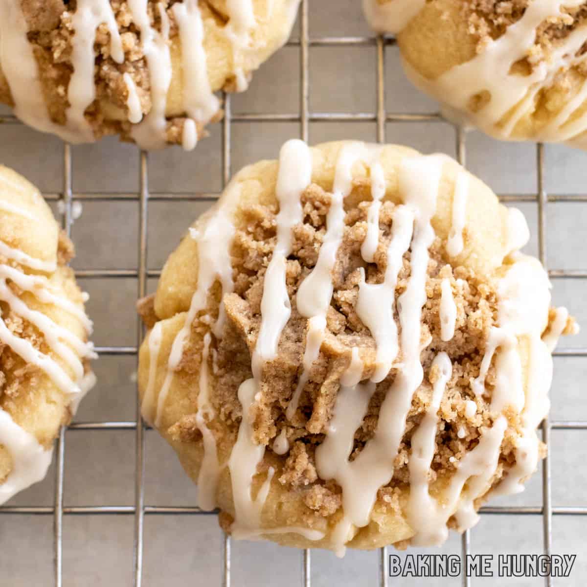 one of the cookies from the coffee cake cookies recipe close up on wire rack