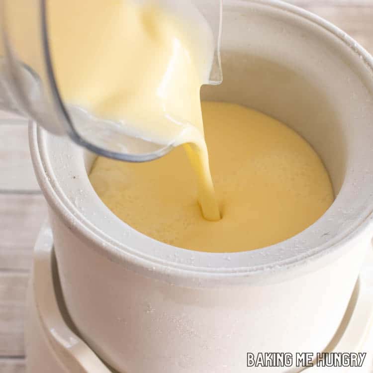 creamy mixture being poured into freezer bowl
