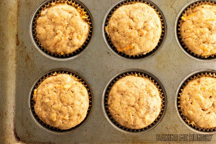 banana muffins with carrots in muffin tin