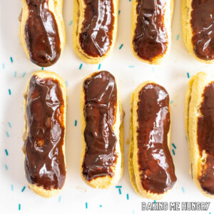 chocolate topped coffee eclairs from overhead on silicone mat