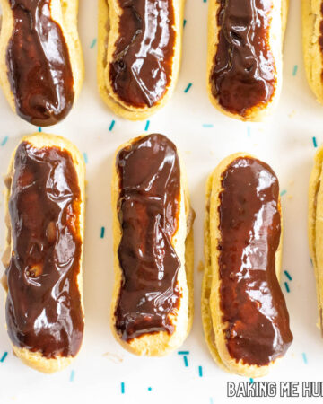 chocolate topped coffee eclairs from overhead on silicone mat