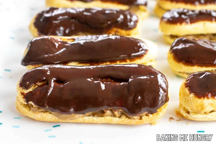 chocolate topped coffee eclairs on silicone mat