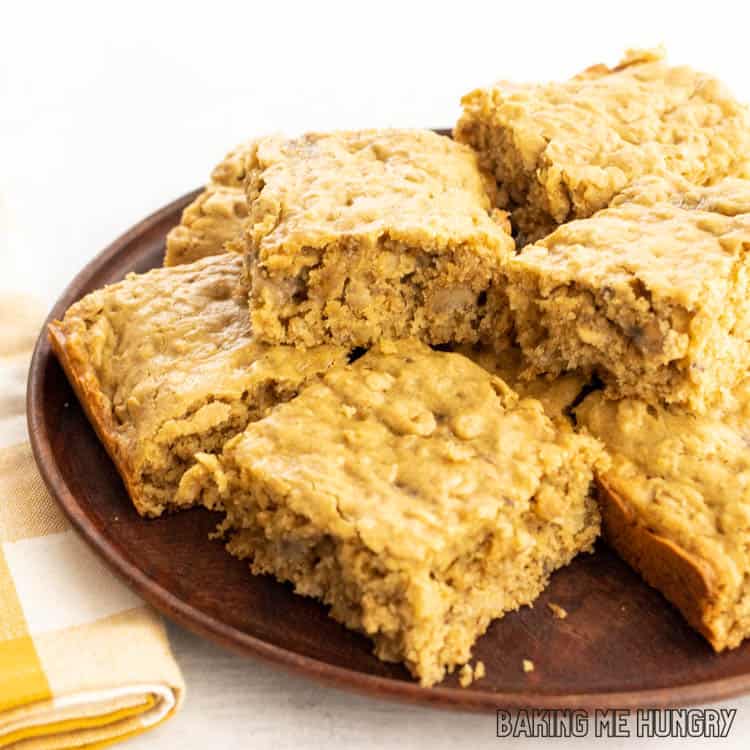 wooden plate with peanut butter banana oatmeal bars