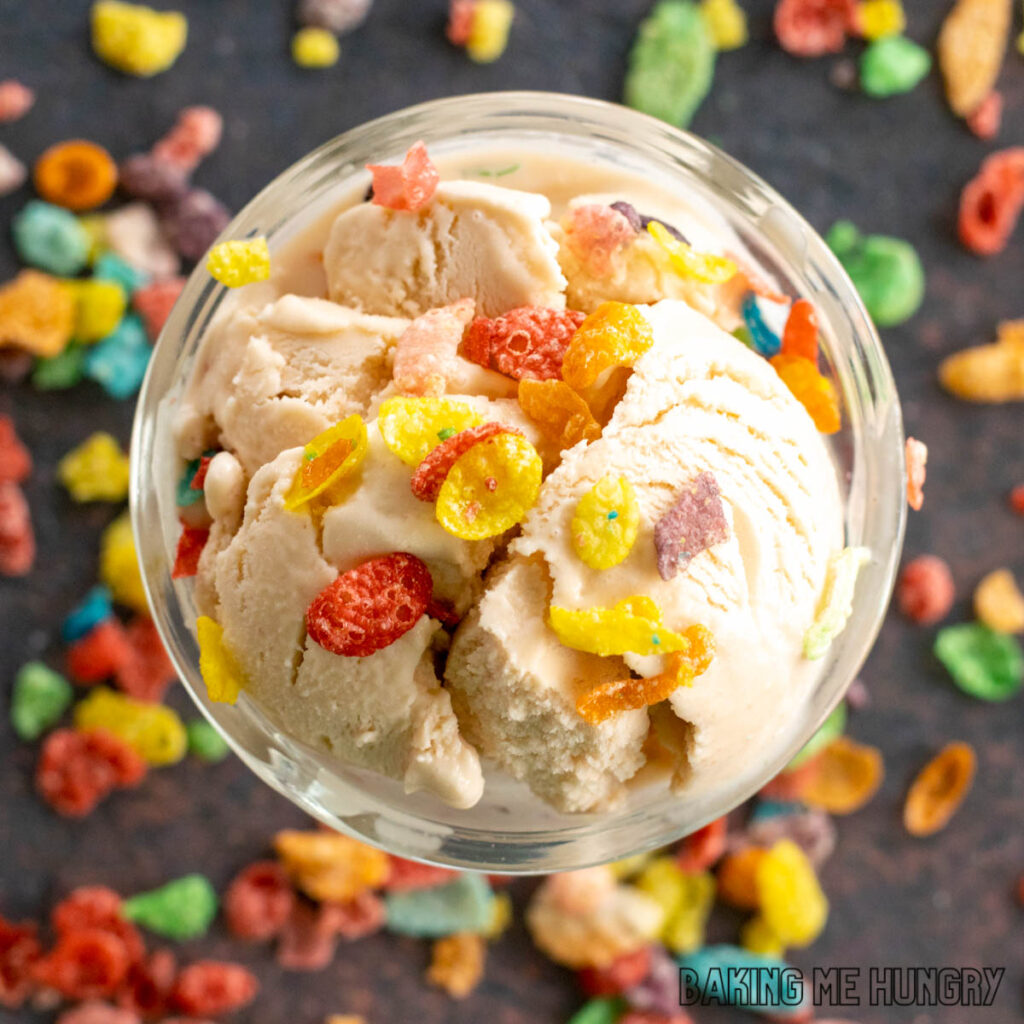 bowl of fruity pebbles ice cream topped with cereal