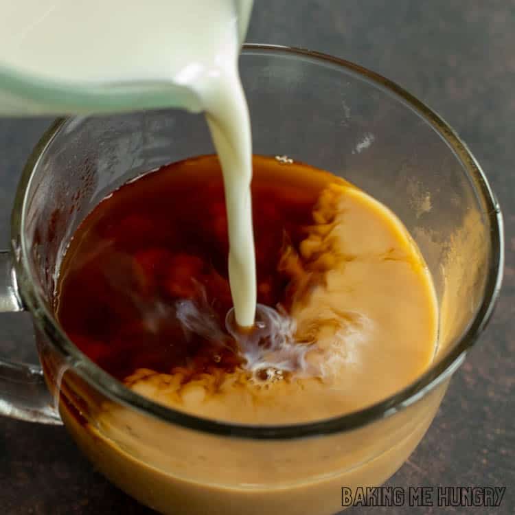 milk being poured into cup