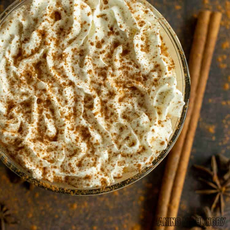 close up of whipped cream and cinnamon topping