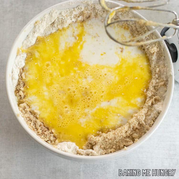 wet ingredients on top of dry ingredients in bowl