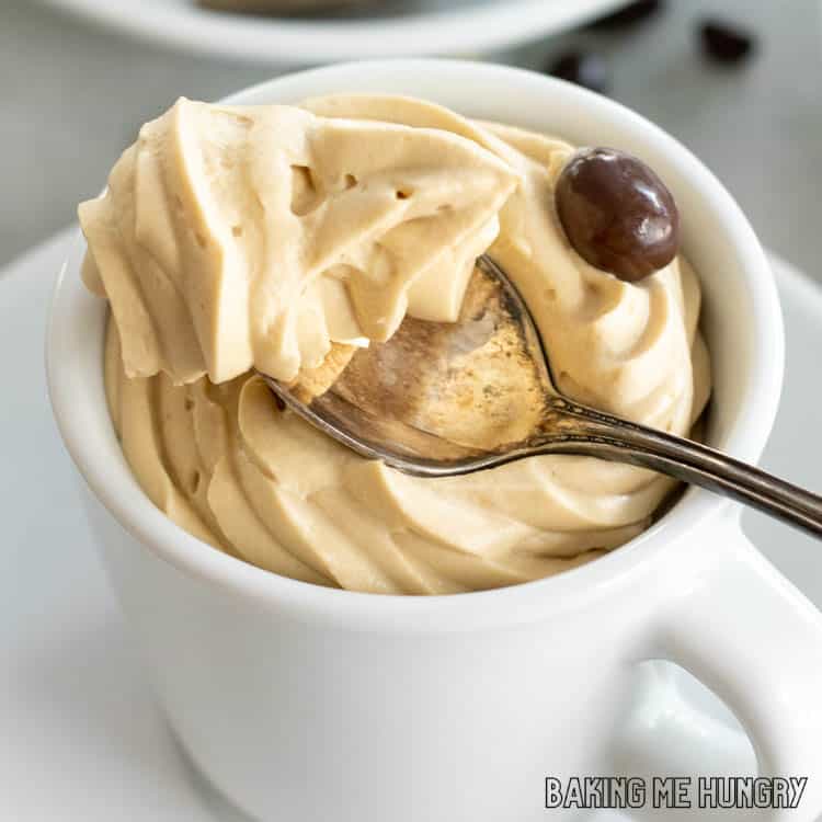 spoon of coffee mousse resting on mug