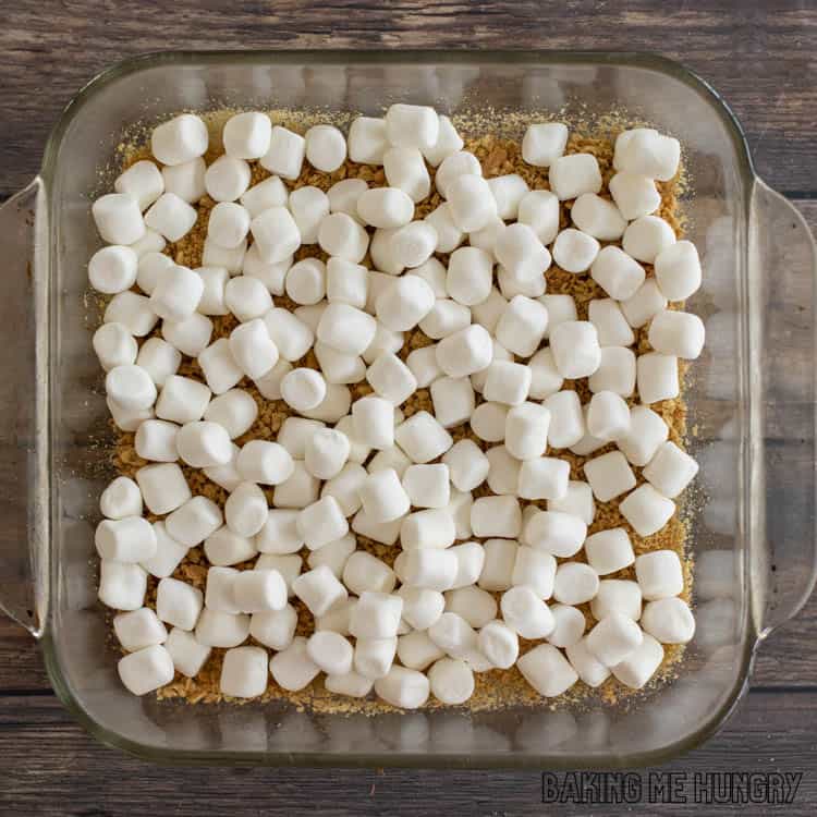mini marshmallows on top of graham crumbs