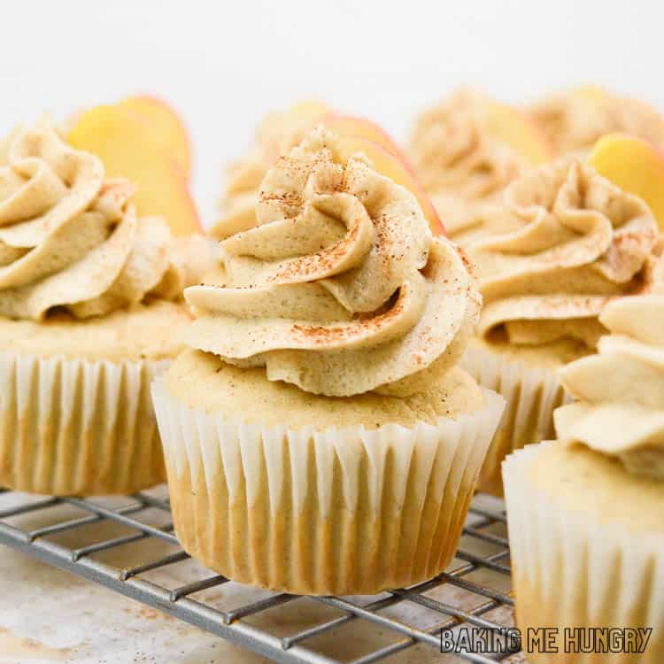 apple cider cupcakes on wire rack from side