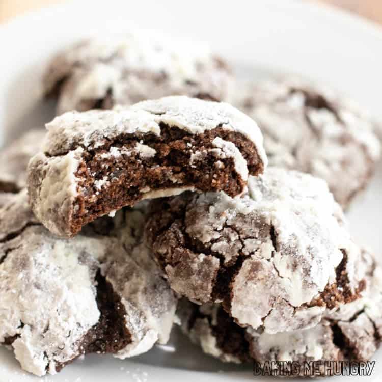 brownie crinkle cookies piled on a plate