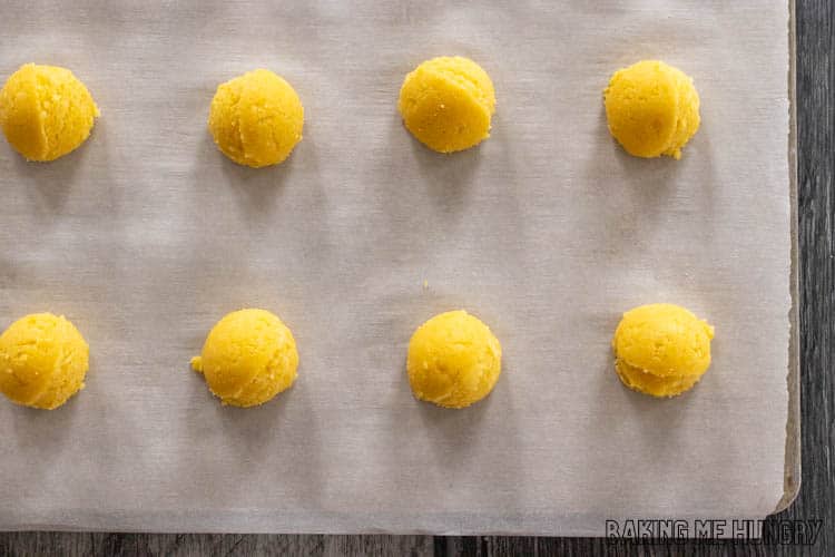 balls of dough on parchment paper