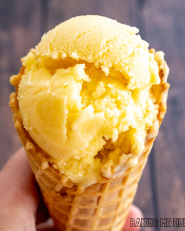 mango coconut ice cream on a waffle cone