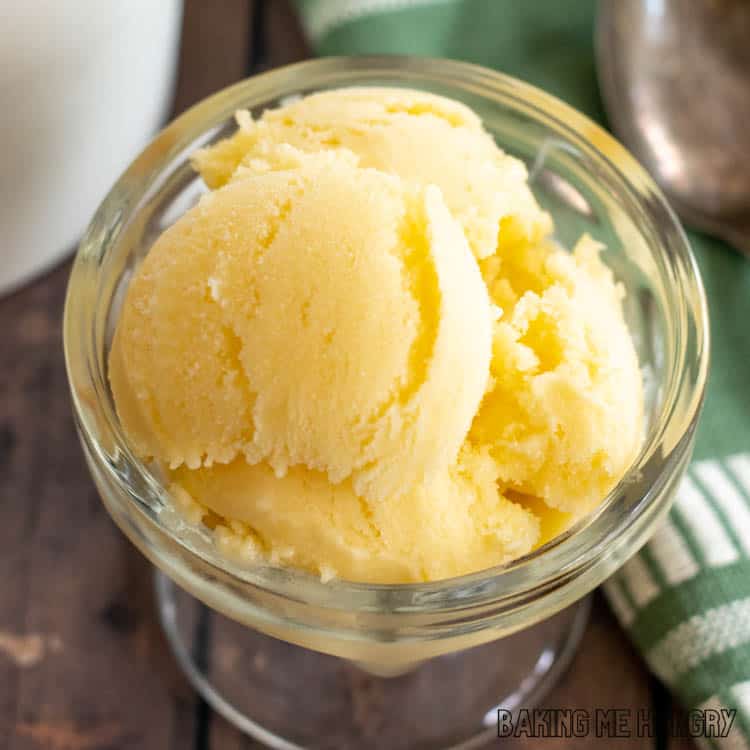close up of mango coconut ice cream in bowl
