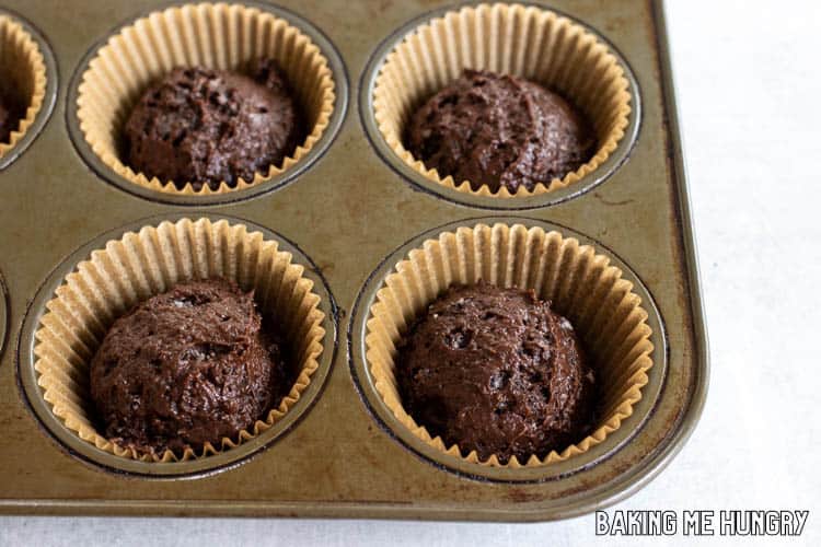 batter in paper lined cupcake pan