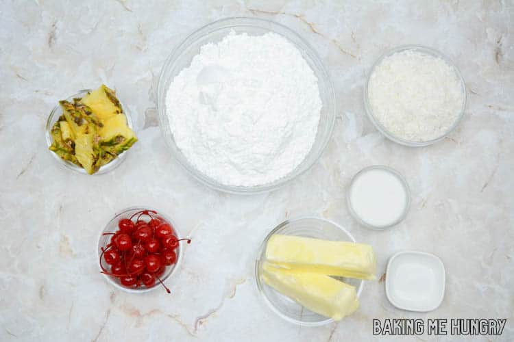 frosting and garnish ingredients in small bowls