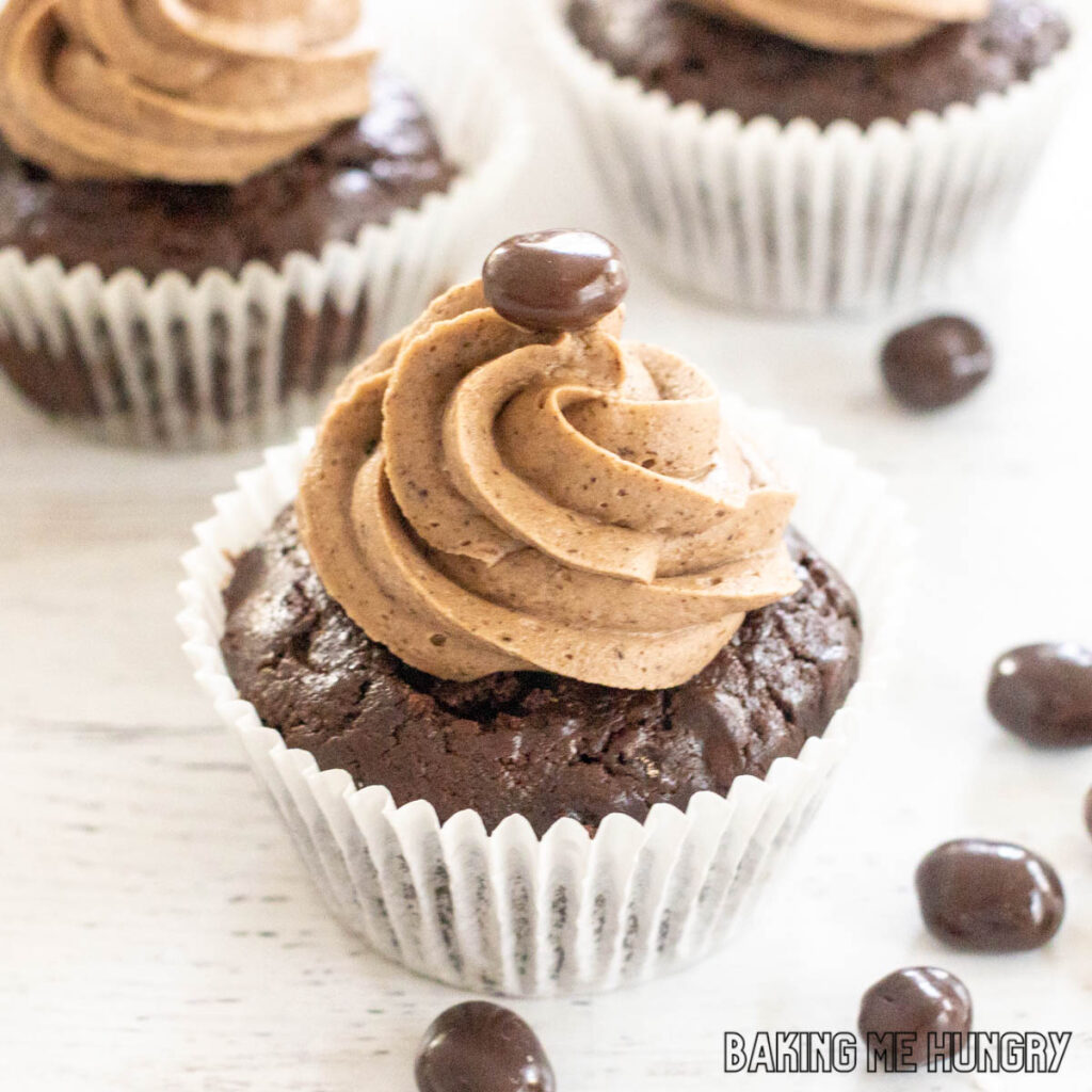 espresso cupcakes recipe with mocha frosting topped with chocolate covered espresso beans