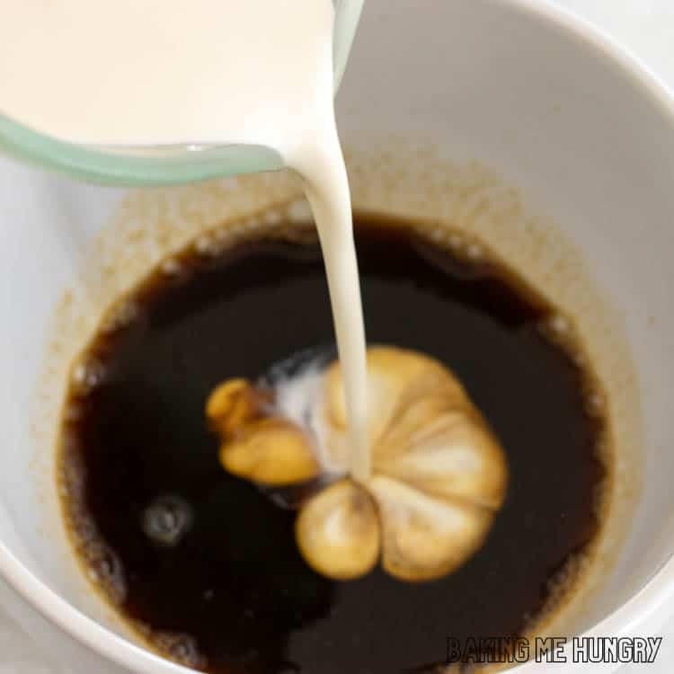 heavy cream being added to coffee mixture
