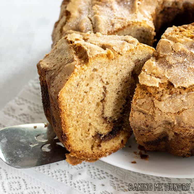 serving knife lifting up a piece of the my grandmas coffee cake recipe served on platter