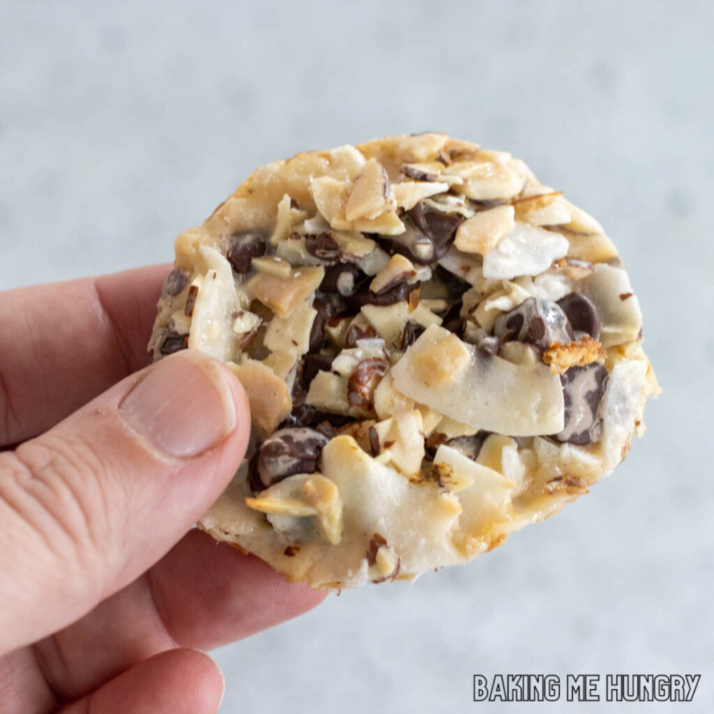hand holding one of the 4 ingredient almond joy cookies