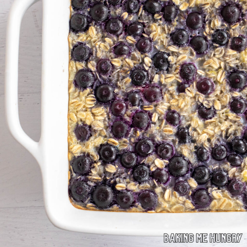 close up of blueberry lemon baked oatmeal in baking dish