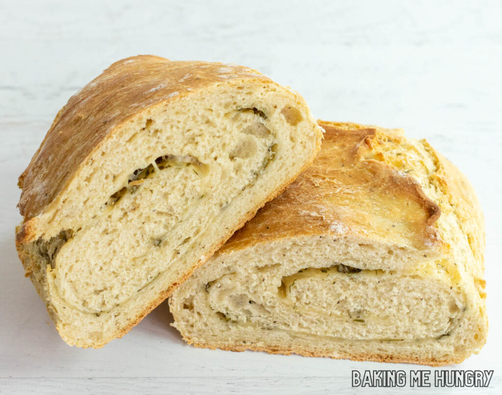 loaf of rosemary parmesan bread cut in half