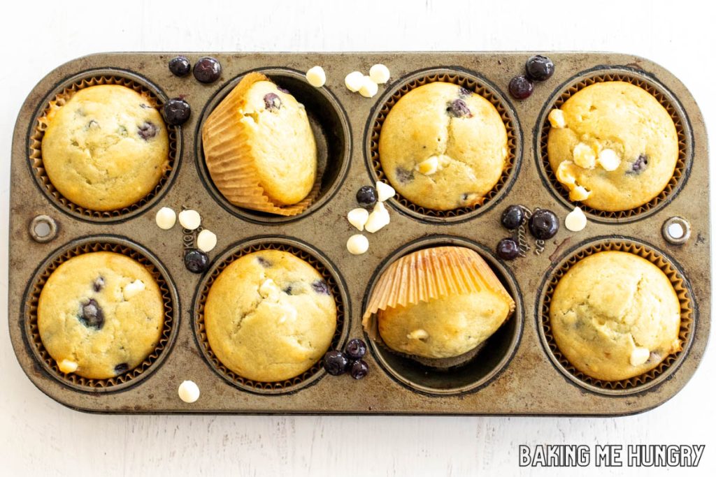 baking pan with blueberry white chocolate muffins
